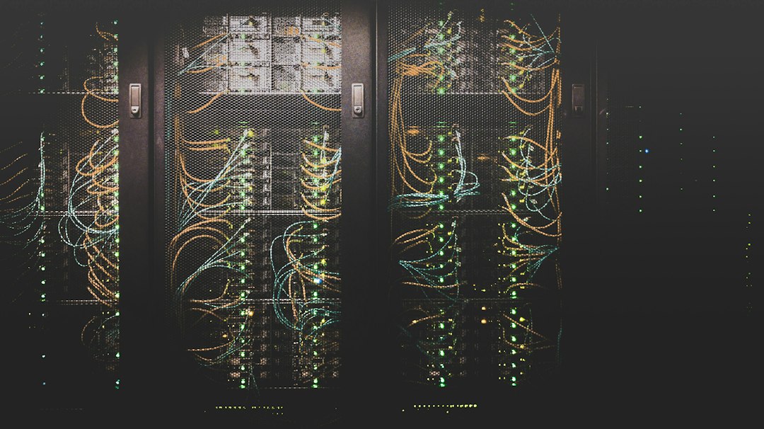 Illustrative server racks in a data center, representing AI infrastructure demand discussed by Federal Reserve officials