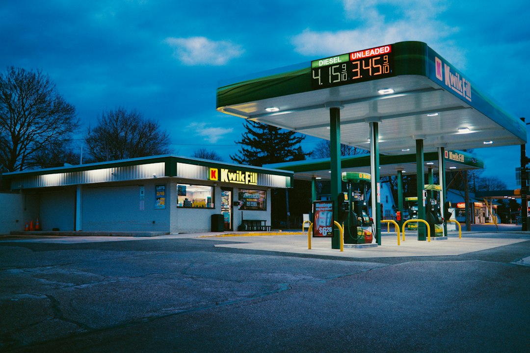 Illustrative gas station at night, accompanying the September CPI report and not a specific price quote.