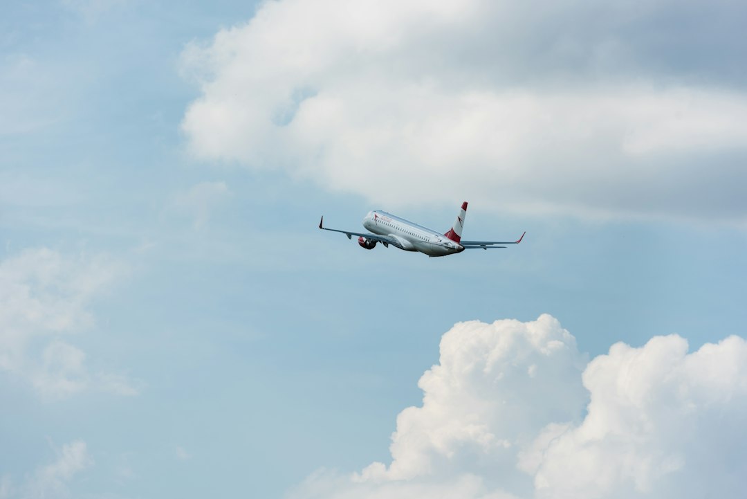 Commercial passenger aircraft in flight, illustrative image only and not identified as an RTX product.