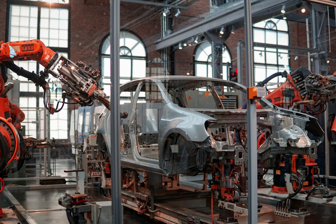 Robotic equipment on a vehicle assembly line, illustrative photo not identified as a General Motors facility.